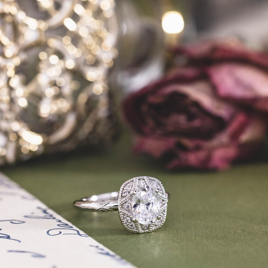 the-madeline-vintage-inspired-oval-diamond-halo-engagement-ring