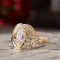 the-magnolia-marquise-diamond-engagement-ring-floral-diamond-accent-nature-inspired-leaf-setting