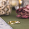 the-margaret-delicate-curved-diamond-contour-band