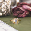 the-margot-emerald-cut-bezel-diamond-halo-engagement-ring