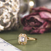 the-margot-emerald-cut-bezel-diamond-halo-engagement-ring