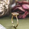 the-margot-emerald-cut-bezel-diamond-halo-engagement-ring