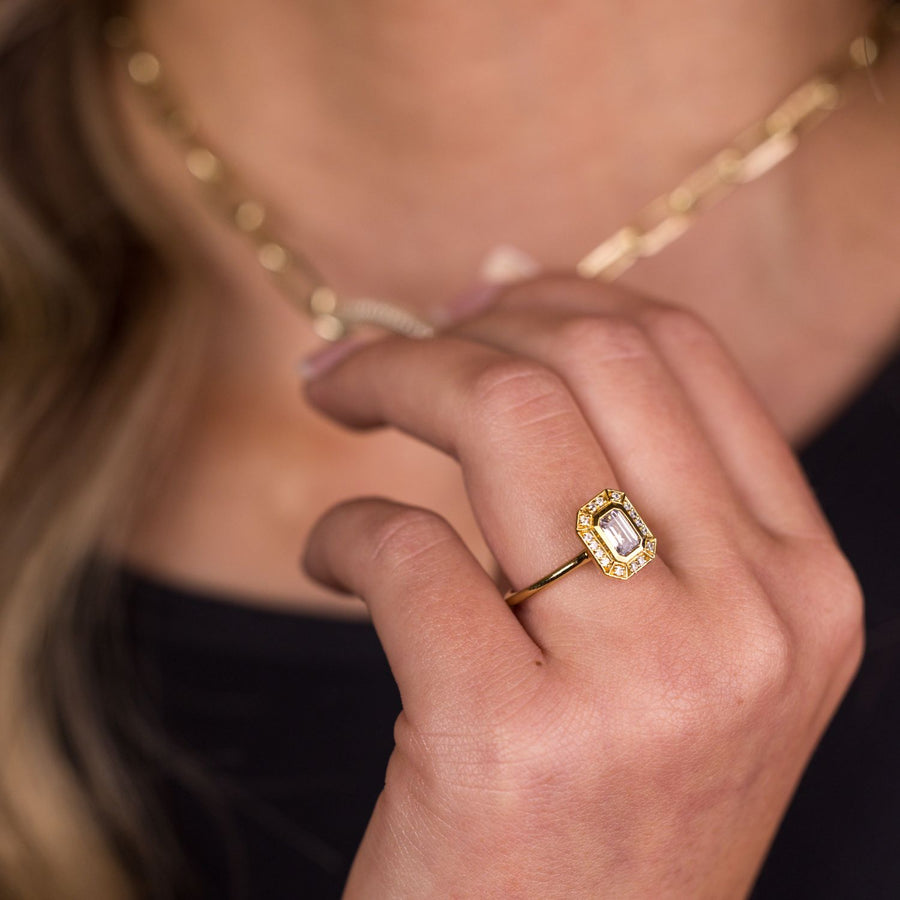 the-margot-emerald-cut-bezel-diamond-halo-engagement-ring