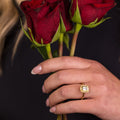 the-margot-emerald-cut-bezel-diamond-halo-engagement-ring