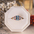 The Maris | Emerald-Cut Aquamarine Engagement Ring with Ruby, Diamond, & Aquamarine Accents