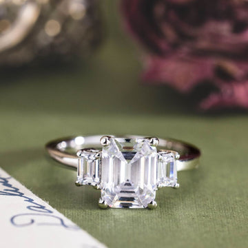 the-marlowe-three-stone-emerald-cut-diamond-engagement-ring-diamond-side-stones