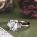 the-marlowe-three-stone-emerald-cut-diamond-engagement-ring-diamond-side-stones