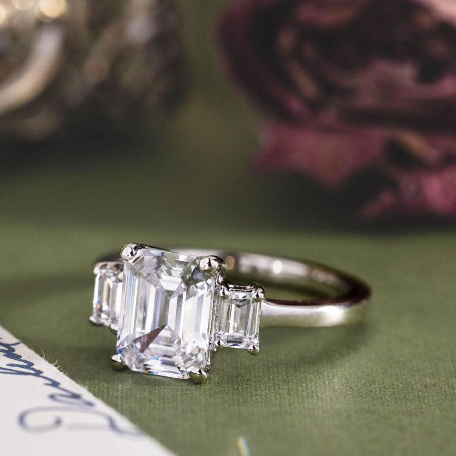 the-marlowe-three-stone-emerald-cut-diamond-engagement-ring-diamond-side-stones
