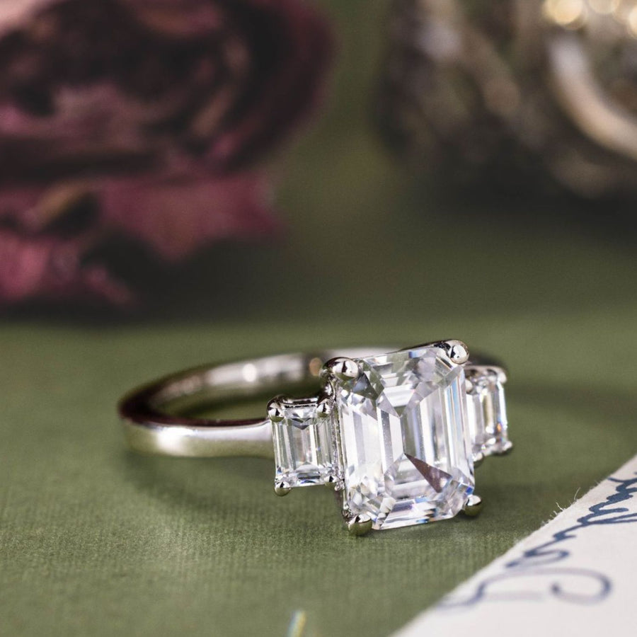 the-marlowe-three-stone-emerald-cut-diamond-engagement-ring-diamond-side-stones