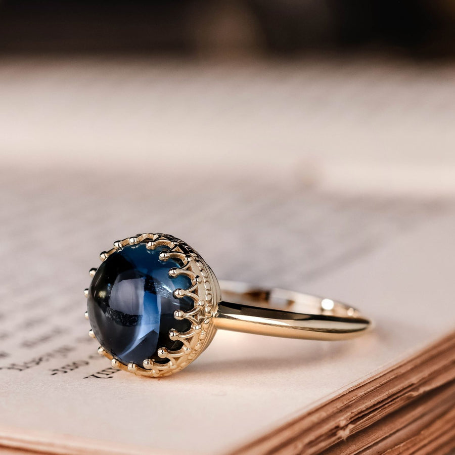 the-maya-natural-blue-topaz-cabochon-ring-crown-prong-bezel-setting