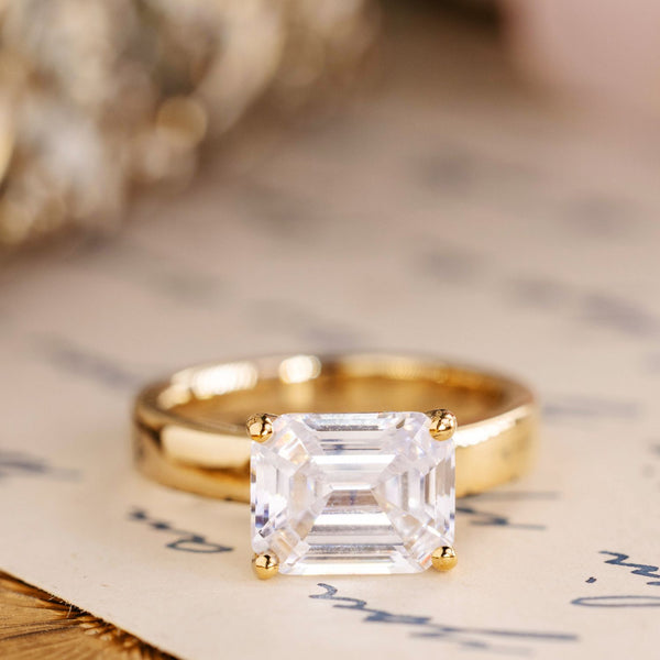 the-mina-chunky-east-west-emerald-cut-diamond-engagement-ring-thick-gold-band