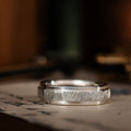 the-orion-mens-faceted-silver-wedding-band