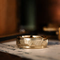 the-orion-mens-faceted-yellow-gold-wedding-band
