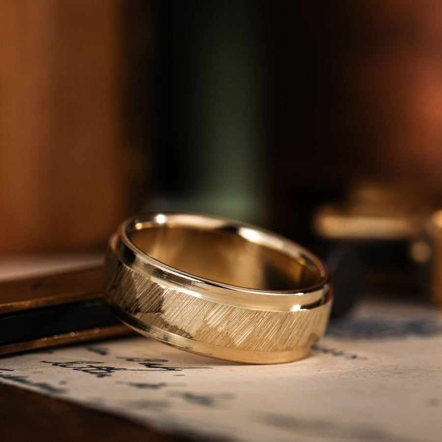 the-orion-mens-faceted-yellow-gold-wedding-band