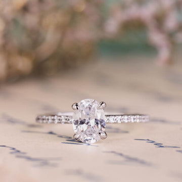 the-penelope-oval-diamond-engagement-ring-claw-prongs-pave-setting
