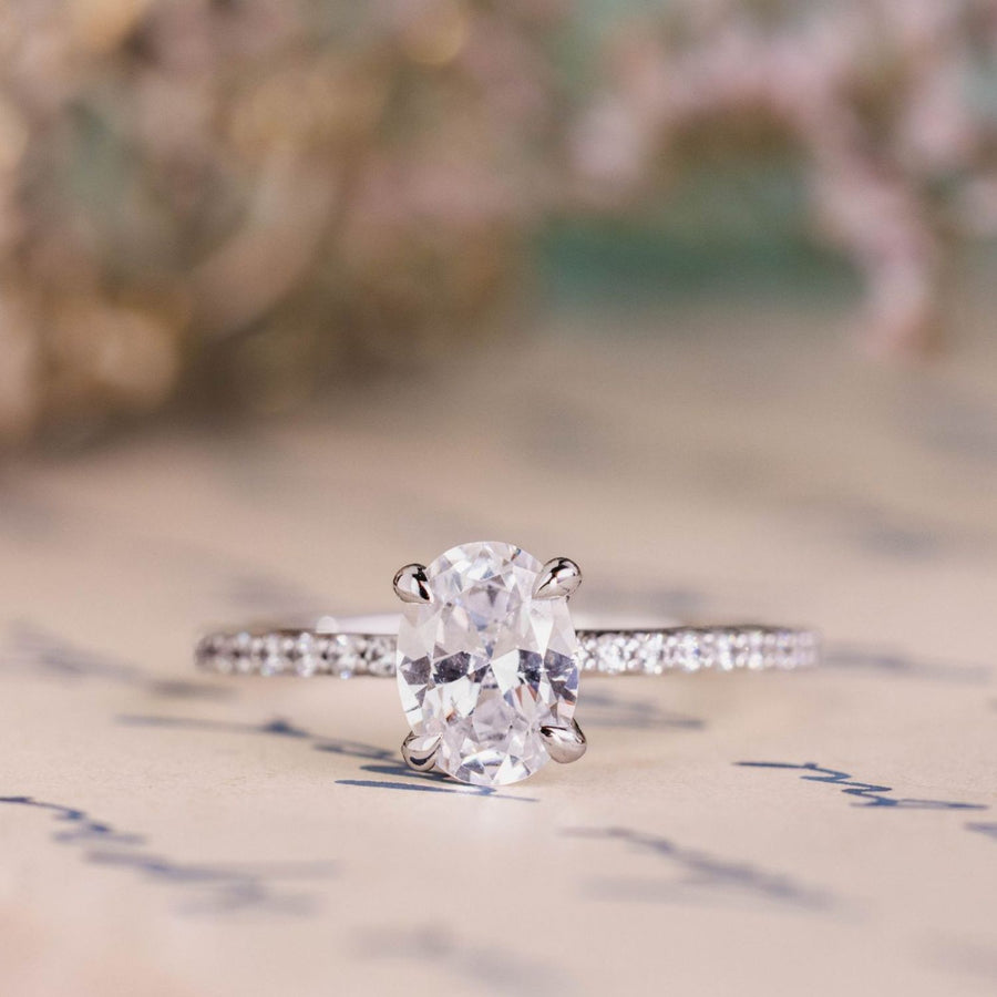 the-penelope-oval-diamond-engagement-ring-claw-prongs-pave-setting