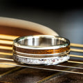 the-pioneer-mens-gold-wedding-band-guitar-string-elk-antler-uss-north-carolina-battleship-teak-wood