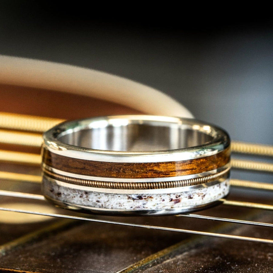 the-pioneer-mens-gold-wedding-band-guitar-string-elk-antler-uss-north-carolina-battleship-teak-wood