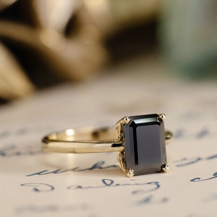 the-raven-emerald-cut-black-moissanite-solitaire-engagement-ring-vintage-inspired-setting