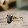 the-raven-emerald-cut-black-moissanite-solitaire-engagement-ring-vintage-inspired-setting