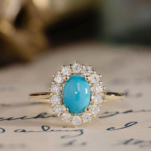 the-robin-oval-turquoise-engagement-ring-diamond-halo