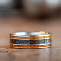 the-saros-mens-titanium-wedding-band-with-meteorite-fossilized-amber