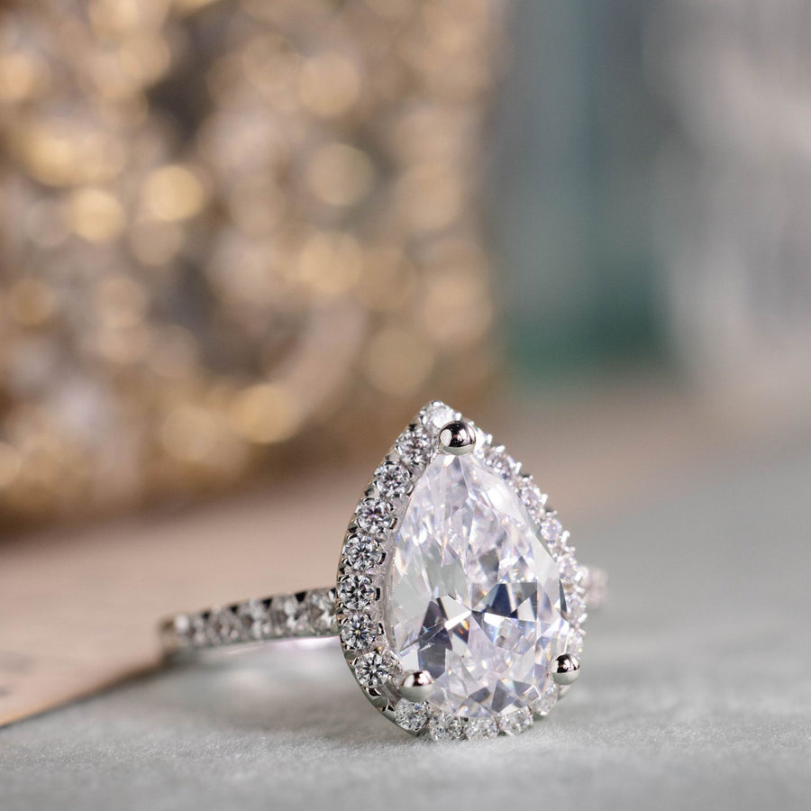 the-tabitha-pear-halo-diamond-engagement-ring-with-pave-diamond-setting