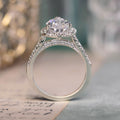 the-tabitha-pear-halo-diamond-engagement-ring-with-pave-diamond-setting