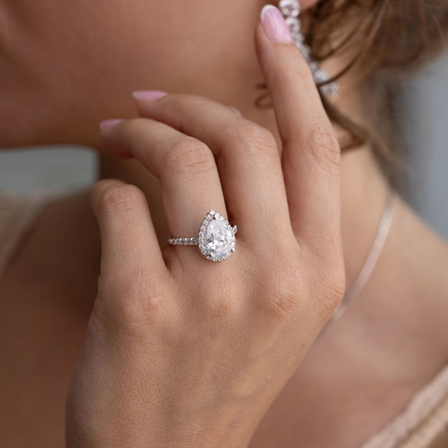 the-tabitha-pear-halo-diamond-engagement-ring-with-pave-diamond-setting