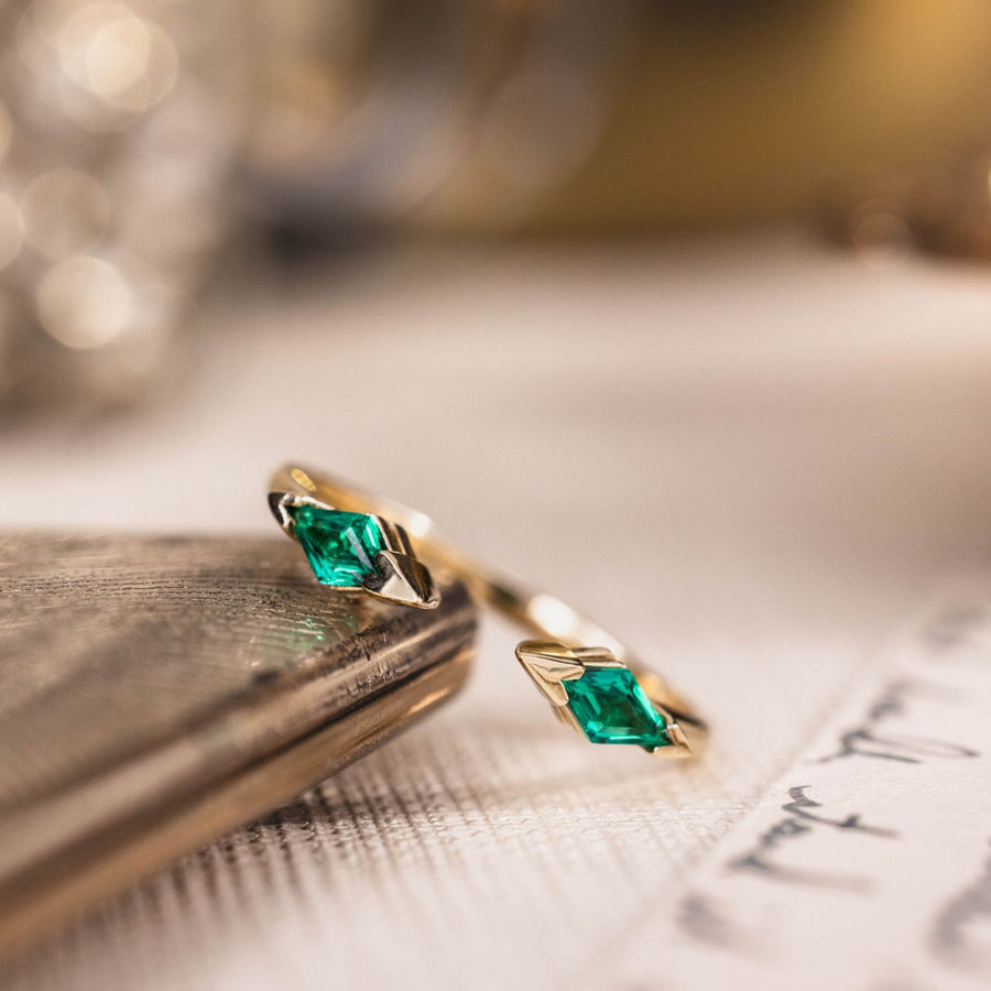 the-tarragon-open-contour-band-kite-step-cut-emeralds