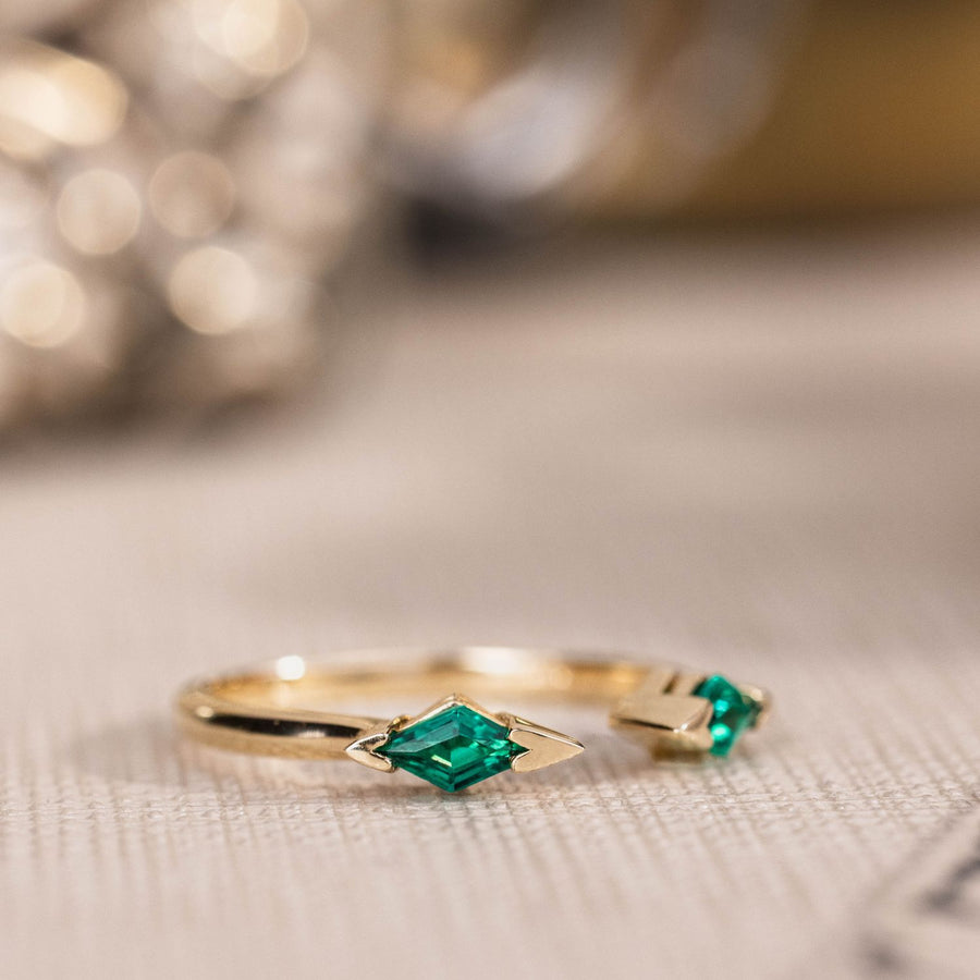 the-tarragon-open-contour-band-kite-step-cut-emeralds