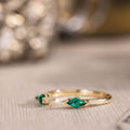 the-tarragon-open-contour-band-kite-step-cut-emeralds