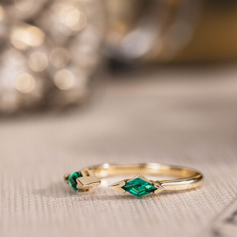 the-tarragon-open-contour-band-kite-step-cut-emeralds