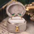 the-tarragon-open-contour-band-kite-step-cut-emeralds
