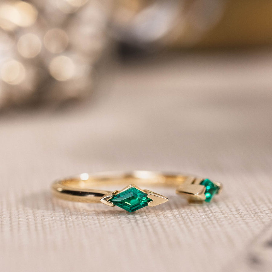 the-tarragon-open-contour-band-kite-step-cut-emeralds