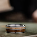 the-teak-and-whiskey-mens-titanium-wedding-band-uss-north-carolina-battleship-teak-wood-whiskey-barrel-wood-rustic-and-main-rings