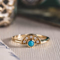 the-thebes-turquoise-solid-gold-sunburst-ring-diamond-accents