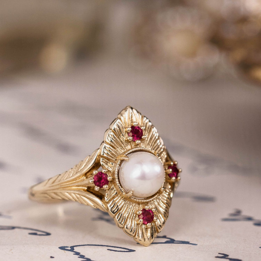 the-theodosia-victorian-inspired-pearl-engagement-ring-anthill-garnet-accents