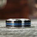 the-thin-blue-line-mens-titanium-wedding-band-with-whiskey-barrel-blue-line