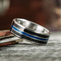 the-thin-blue-line-mens-titanium-wedding-band-with-whiskey-barrel-blue-line