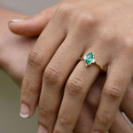 the-verdeline-marquise-cut-green-emerald-engagement-ring-natural-diamond-accents