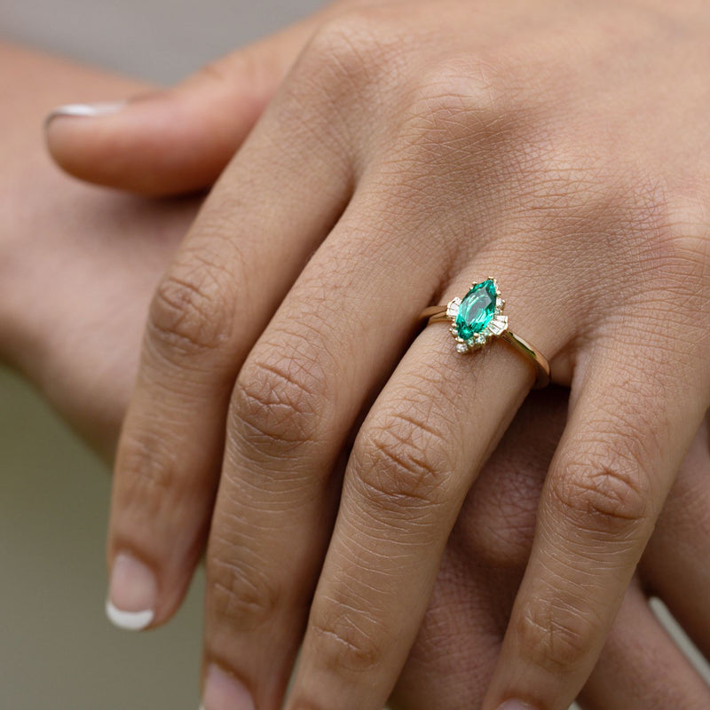 the-verdeline-marquise-cut-green-emerald-engagement-ring-natural-diamond-accents