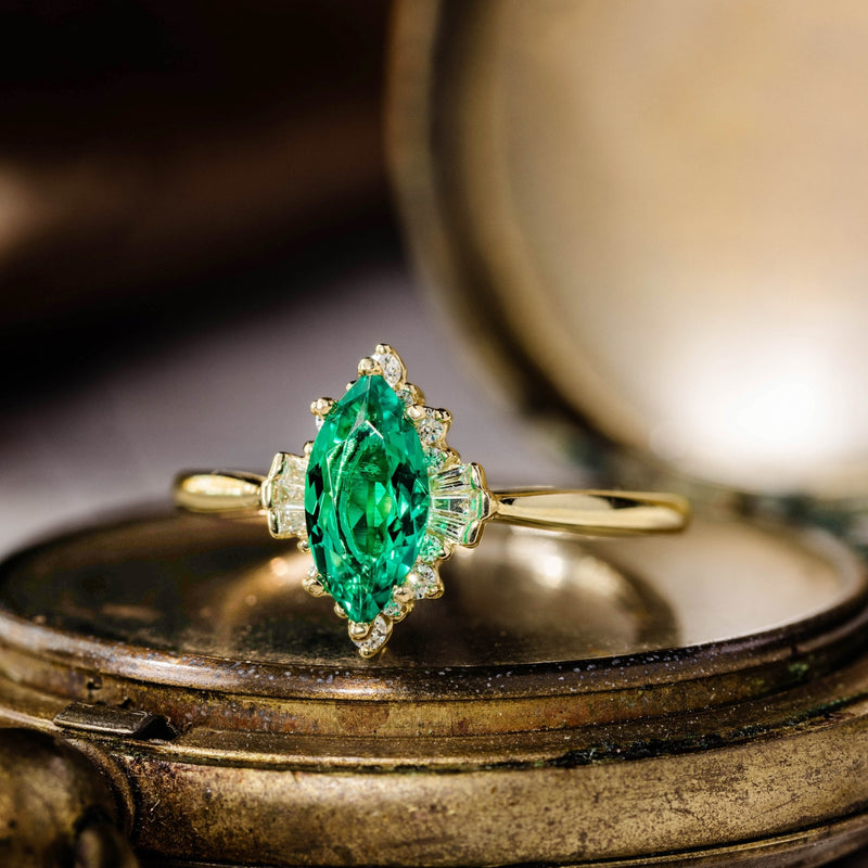 the-verdeline-marquise-cut-green-emerald-engagement-ring-natural-diamond-accents