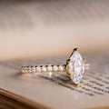 the-verity-marquise-diamond-engagement-ring-pave-diamond-setting