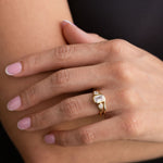 three-stone-emerald-cut-diamond-engagement-ring-round-diamond-accents-bezel-setting-the-marcelline-rustic-and-main