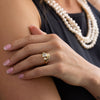 three-stone-emerald-cut-diamond-engagement-ring-round-diamond-accents-bezel-setting-the-marcelline-rustic-and-main