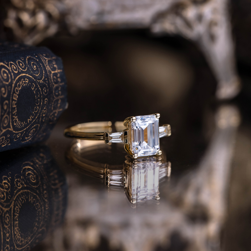 three-stone-emerald-cut-diamond-engagement-ring