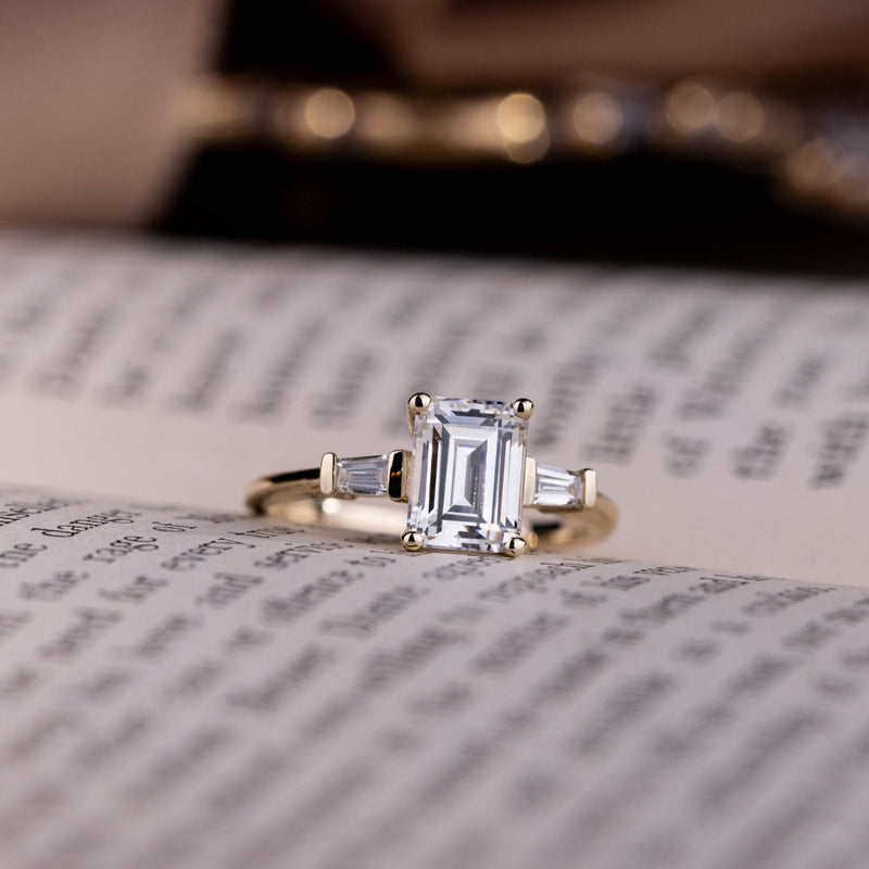 three-stone-emerald-cut-diamond-engagement-ring