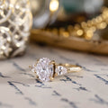 three-stone-oval-diamond-engagement-ring-pear-shaped-diamond-accents-pave-setting-the-marielle-rustic-and-main
