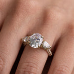three-stone-oval-diamond-engagement-ring-pear-shaped-diamond-accents-pave-setting-the-marielle-rustic-and-main